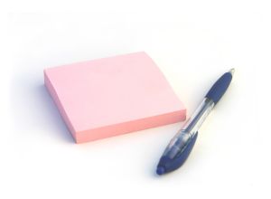 Sticky note and pen